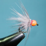 Gray Firebead Ray Charles Fly in a tying vice