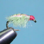 Image of a Ray Charles fly in a tying vice